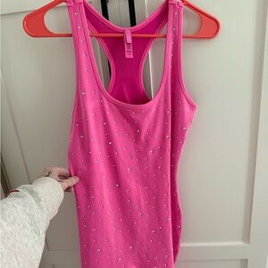 Skims rhinestone bodysuit. Pink. Never worn. Size Large.